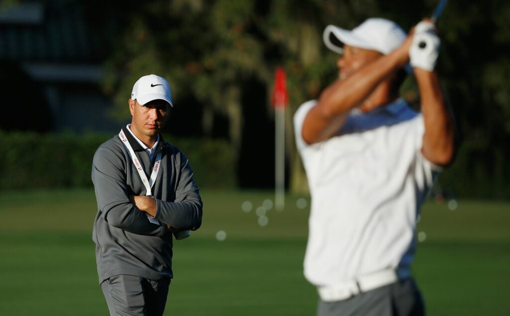 Tiger Woods and Chris Como