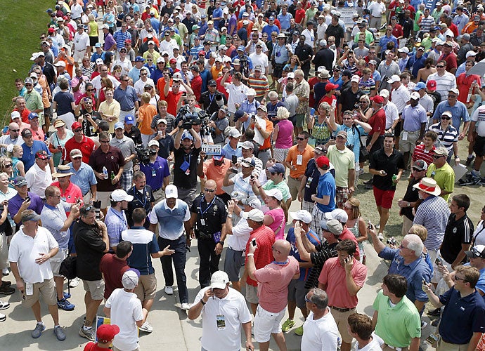 Fans sure took notice, as they followed Woods in throngs during his practice round. Rest assured, the group wasn’t there to watch Harris English play with Steve Stricker. It was about all the excitement that Woods could conjure up, however, missing the cut with two rounds of 74. 