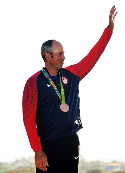 Matt Kuchar celebrating his bronze medal.