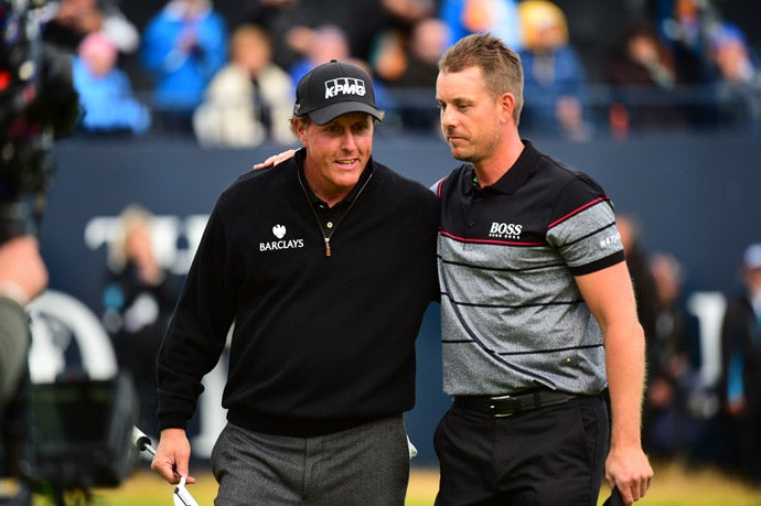 Phil Mickelson congratulates Stenson after the round.