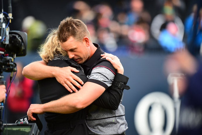 Stenson embraces his wife following his victory.