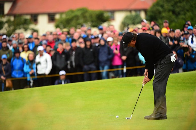 Phil Mickelson putts on Sunday.