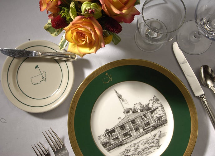 Customized china with images of the clubhouse and the club logo decorate the tables in the main dining room.