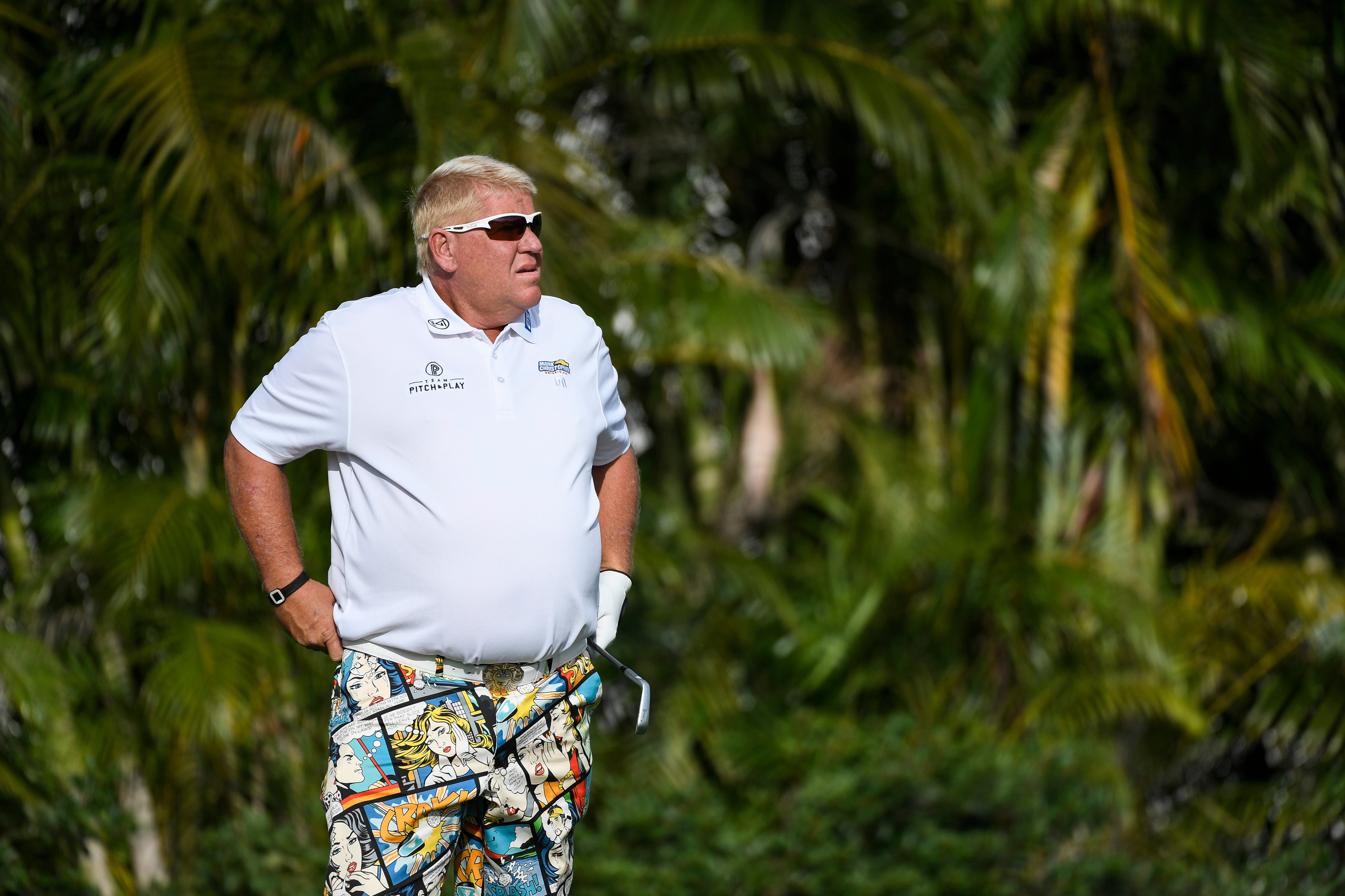 John Daly Steps Into Water Hazard To Hit Shot