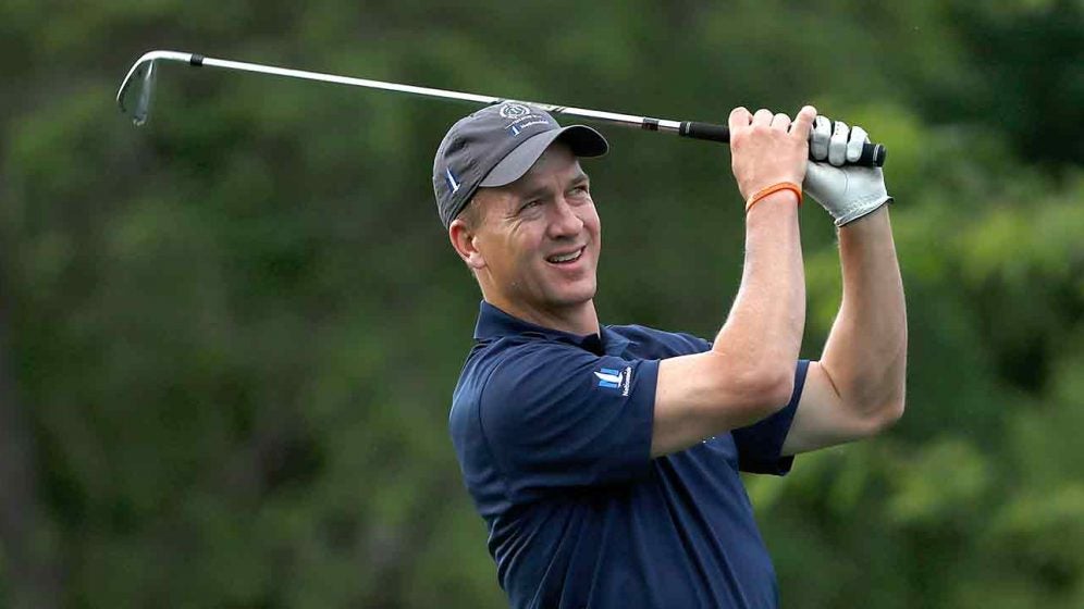 Peyton Manning hits the golf course with President Donald Trump