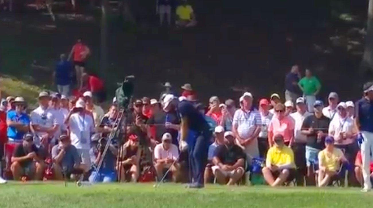 WATCH Dustin Johnson nearly hit by flying golf ball during tee shot at