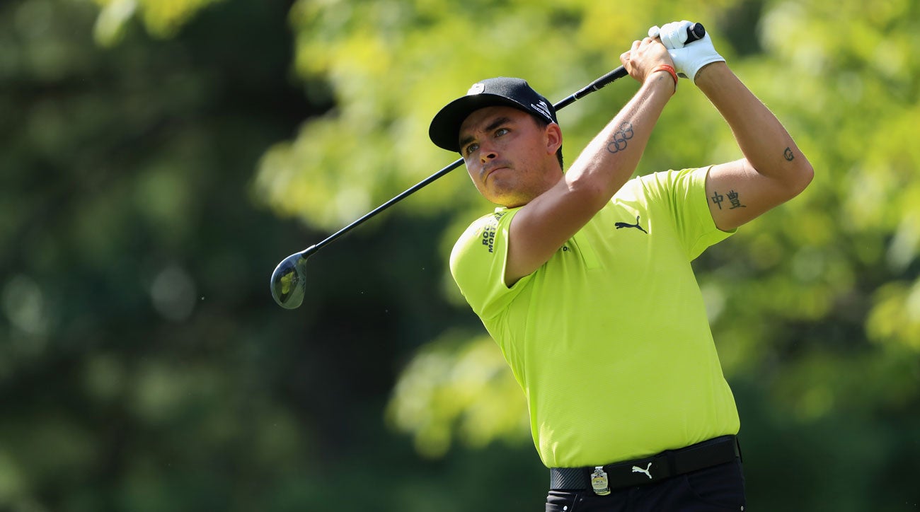 Rickie Fowler charges into 18-hole lead at PGA Championship