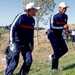 Phil Mickelson and Tiger Woods walking at Ryder Cup.