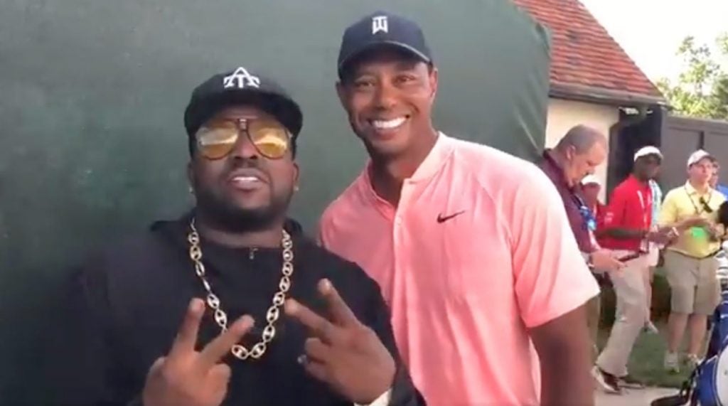 Tiger Woods and rapper Big Boi smile for the cameras at the Tour Championship.