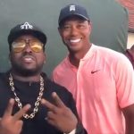 Tiger Woods and rapper Big Boi smile for the cameras at the Tour Championship.