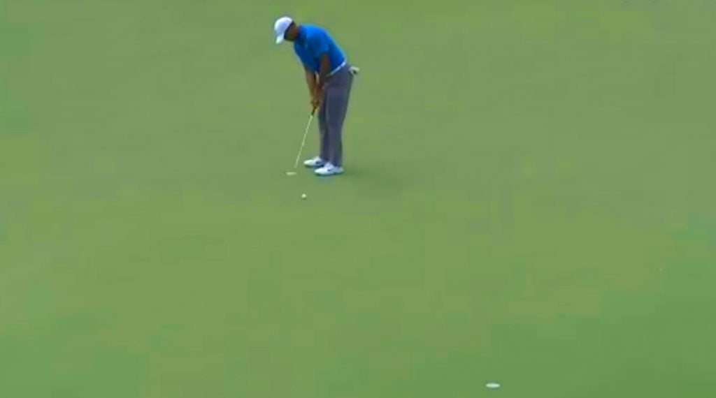 Tiger Woods makes birdie at 1 Saturday at the Tour Championship