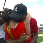 Tiger Woods embraces girlfriend Erica Herman after his Tour Championship win.
