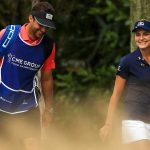 Lexi Thompson and her brother and caddie walk off the tee on Sunday.