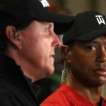 Tiger Woods stares at Phil Mickelson during their Tuesday press conference for The Match.