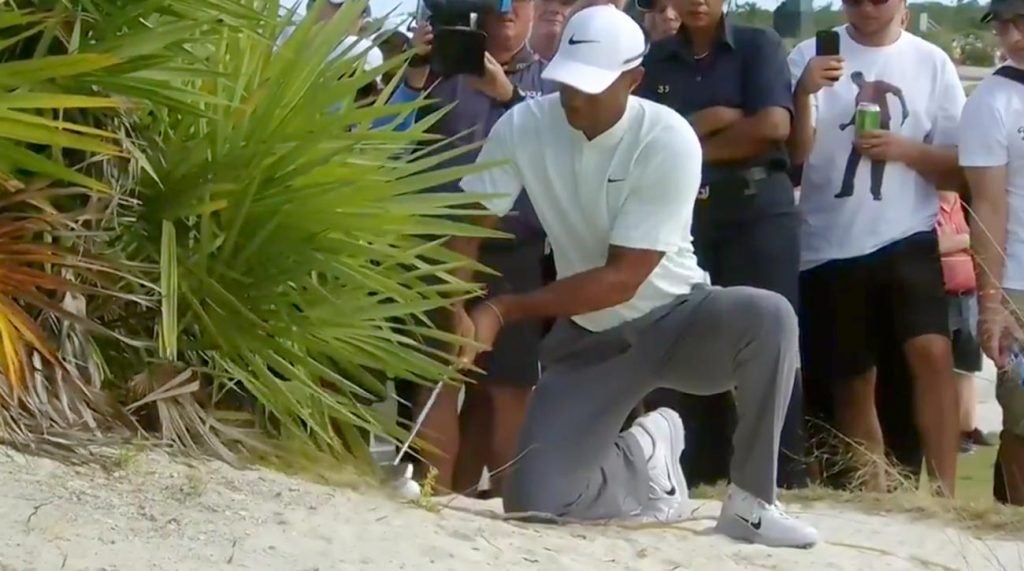 Tiger Woods hits his second shot on the 18th hole during the second round of the Hero World Challenge.