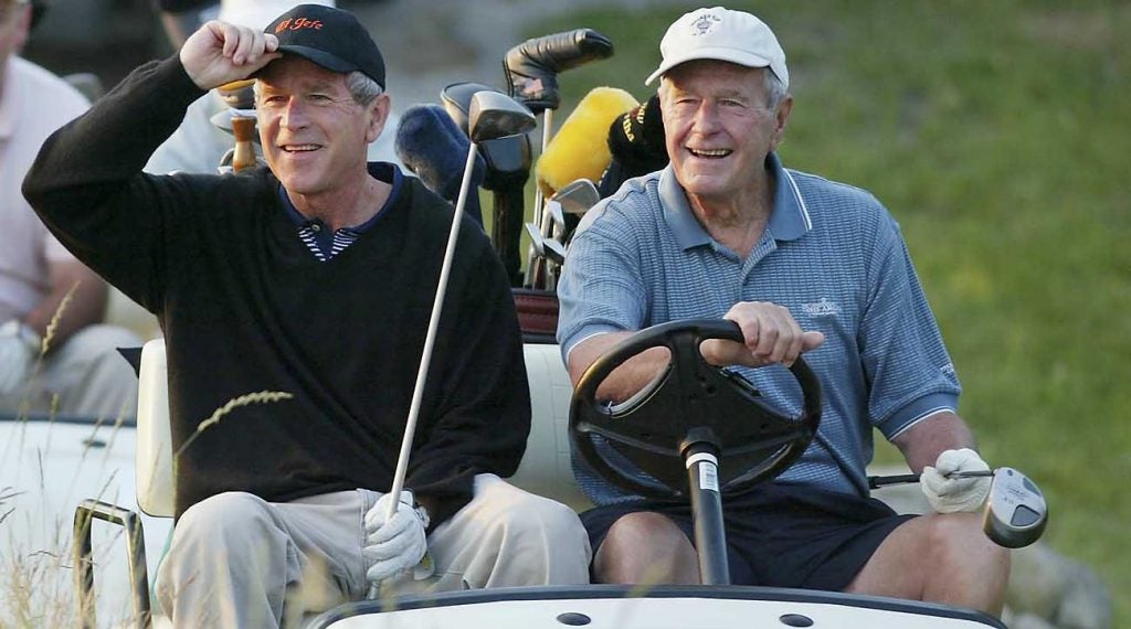 George H.W. Bush (right) and George W. Bush (left), pictured here in 2002, have always shared a love for the game of golf. 