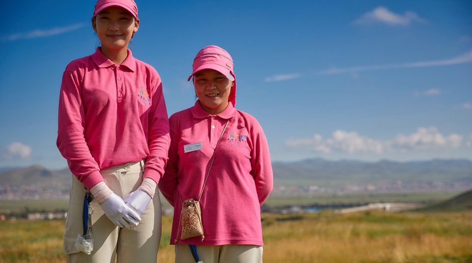 Ollie’s caddie (right) and the other caddie in the group (left). All the caddies in Mongolia are female, and all are taught golf themselves.