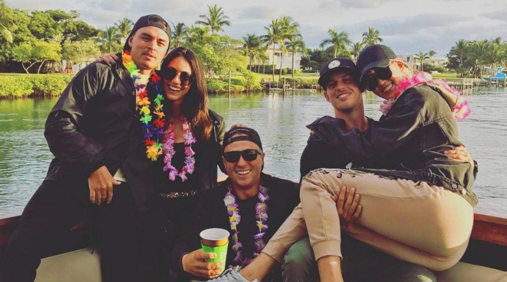 Rickie Fowler and fiancee Allison Stokke (left) with Justin THomas (center), Brad Gehl and Michelle Wie.
