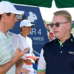 Rory McIlroy speaks with Keith Pelley, CEO of the European Tour, during the 2018 DP World Tour Championship.