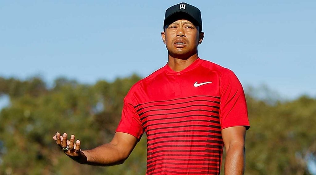Tiger Woods reacts after a missed putt at the 2018 Farmers Insurance Open.