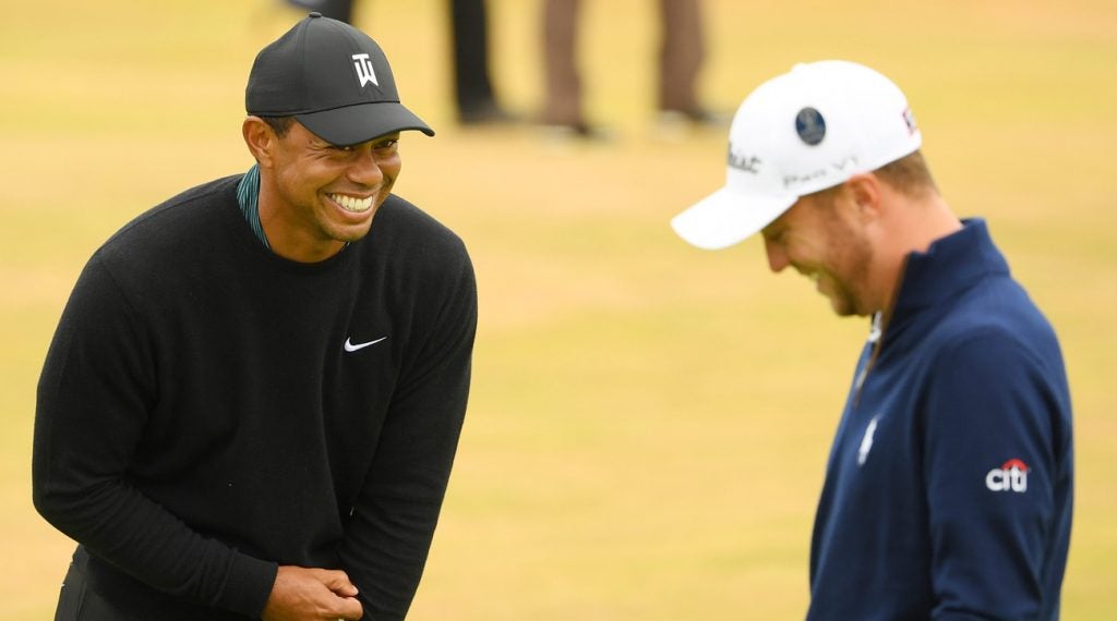 Tiger Woods and Justin Thomas laugh during a practice round at the 2018 Open Championship