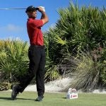 Tiger Woods tees off during the final round of the Hero World Challenge on Sunday.