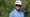 Gary Woodland walks off the green at the Sentry Tournament of Champions.