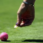 Marking ball on green