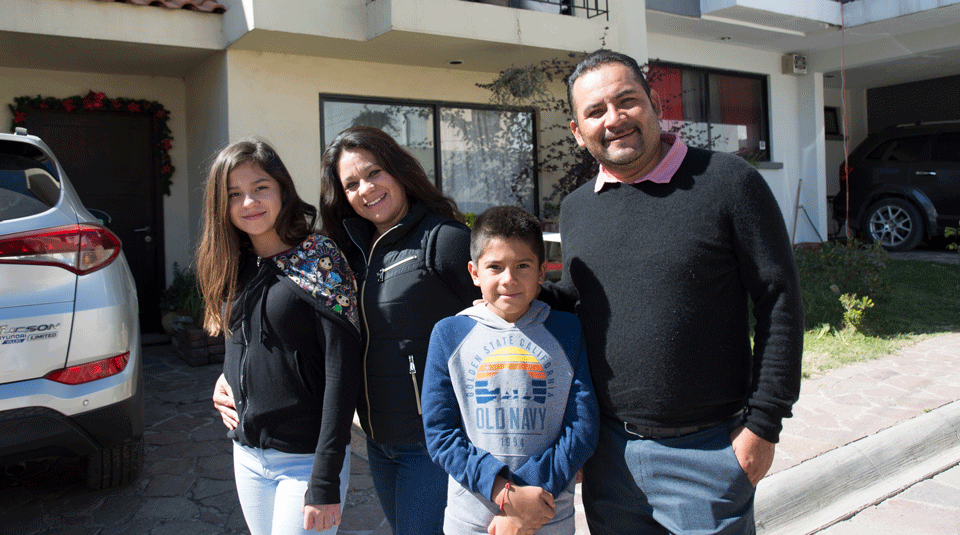 Rodriguez (R) his wife, Blanca Nieves Gonzalez, their son, José de Jesús Rodriguez, 10, and their daughter, Ximena Rodriguez, 12, ouside their home, located in Irapuato,  in Mexico’s Guanajuato state.