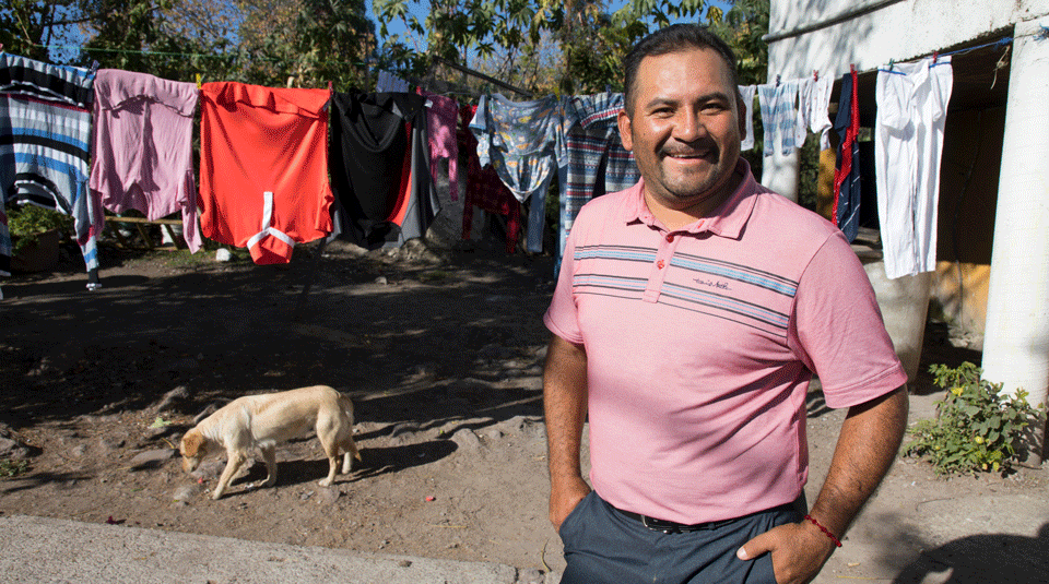 At his mother’s home in Irapuato, Guanajuato, Mexico, Mexican golf star José de Jesús Rodriguez stands in front of the now empty plot of land where his one room childhood home once stood.