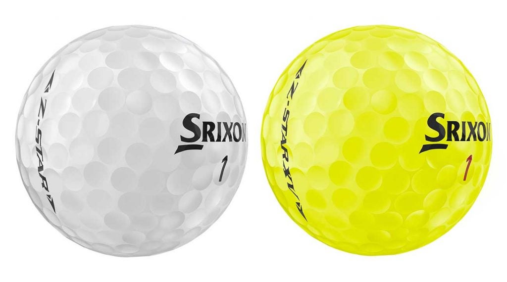A white and yellow golf ball from the Srixon Z-STAR series.