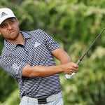 Xander Schauffele chips onto the green during the final round of the Sentry Tournament of Champions.