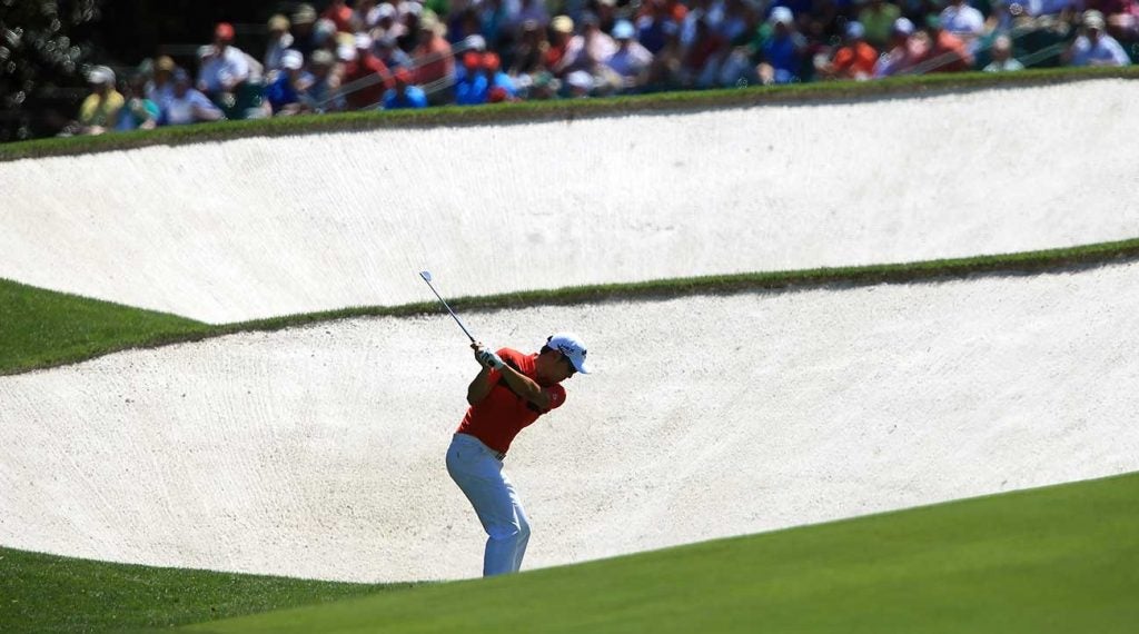 Hideki Matsuyama plays the 5th hole during the Masters at Augusta National.