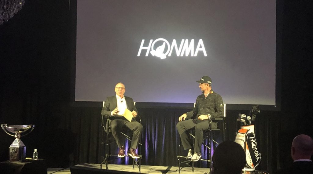 Honma's Mark King and Justin Rose
