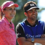 Lexi Thompson talks with her caddie and brother, Curtis Thompson, at the LPGA CME Group Tour Championship in 2018.