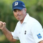 Matt Kuchar pumps his fist after making a birdie putt on the 15th hole during the final round of the Sony Open on Sunday.