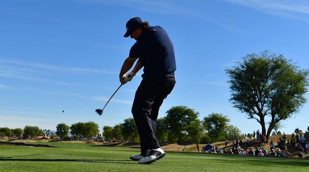 Phil Mickelson tees off during the third round of the Desert Classic.