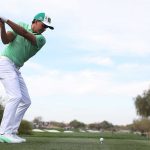 Rickie Fowler tees off during the first round of the 2019 Waste Management Phoenix Open.