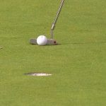 Tiger Woods prepares to hit his putt on the 11th hole Thursday during the 2019 Farmers Insurance Open.