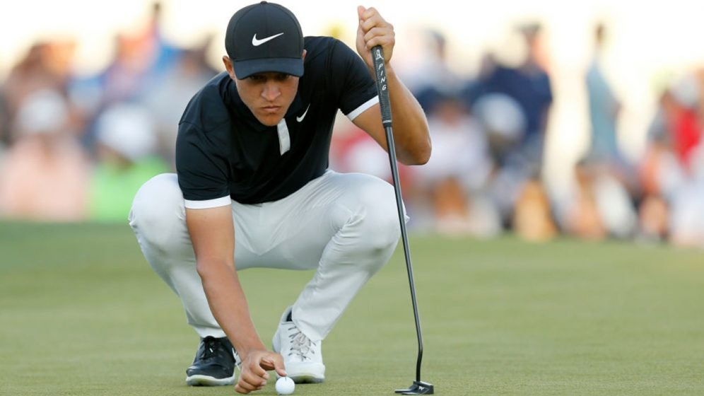Cameron Champ rocks one white, one black pair of shoes to commemorate ...