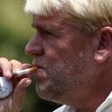 John Daly takes a smoke break as he waits to tee off on the ninth hole during the third round of the Crowne Plaza Invitational at Colonial at Colonial Country Club in Fort Worth, Texas, Saturday, May 26, 2012. (Richard W. Rodriguez/Fort Worth Star-Telegram/MCT)