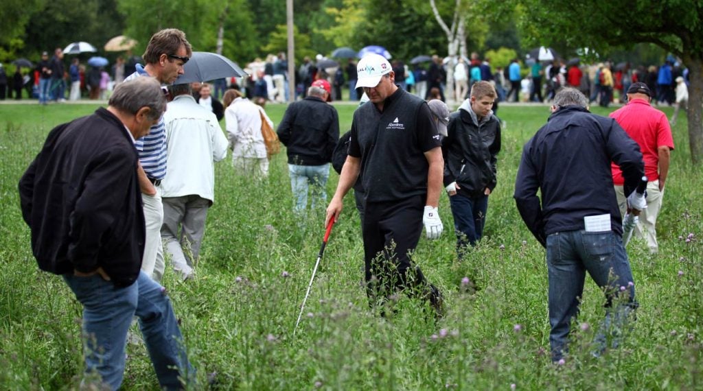 Paul Lawrie looks for his lost ball during the 2011 BMW International Open.