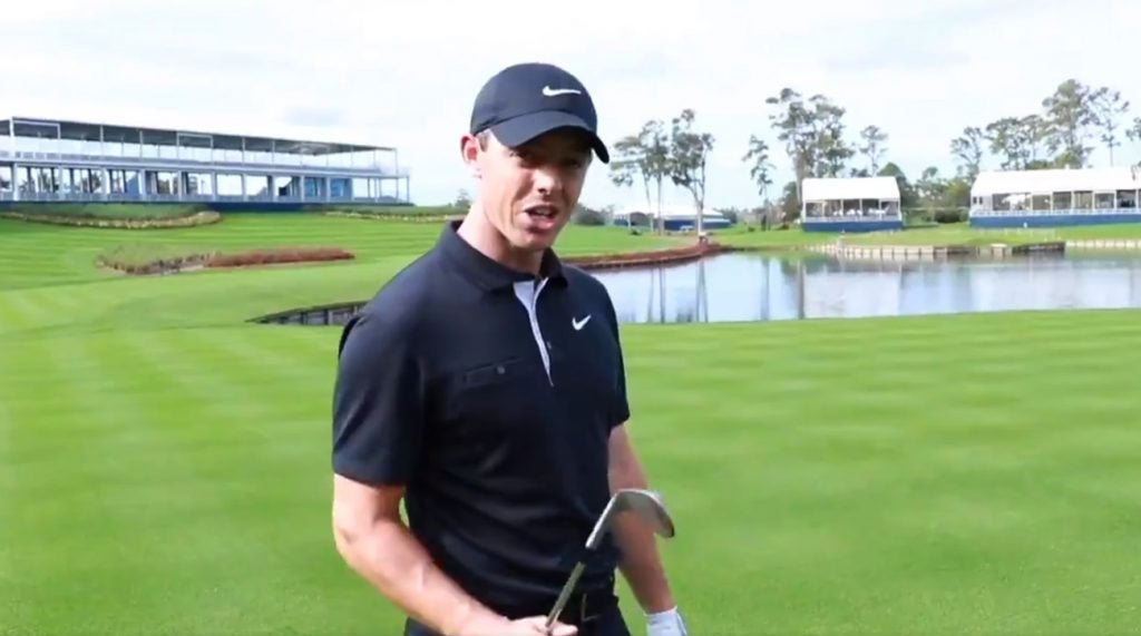 Rory McIlroy during his "13 club challenge" at TPC Sawgrass's par-3 17th hole
