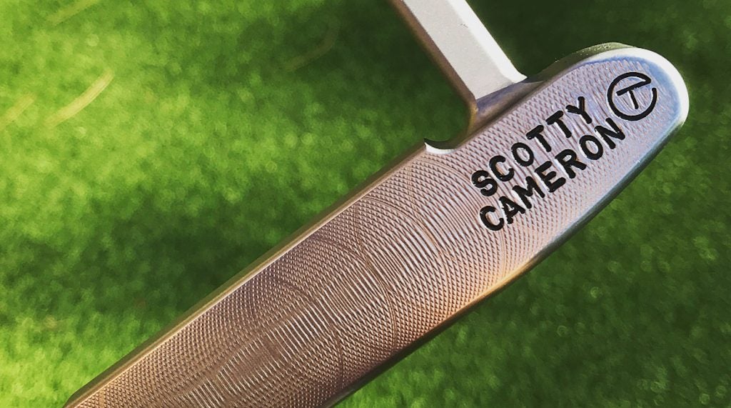 A Circle T logo is positioned prominently on the heel of Paul Casey's Scotty Cameron putter. 