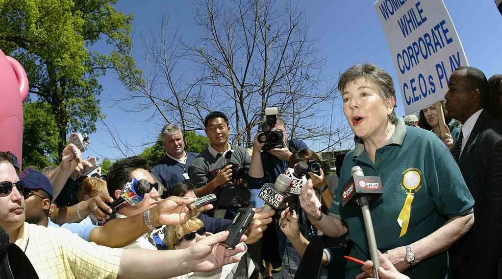 Martha Burk at the mic in 2003.