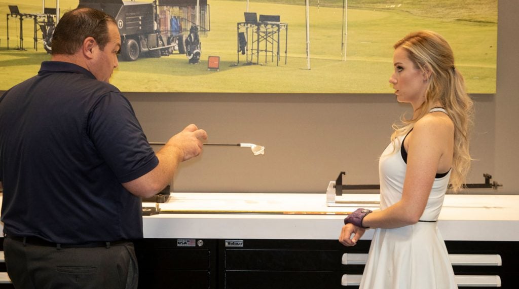 True Spec's Tim Briand discusses different shaft options with Paige.