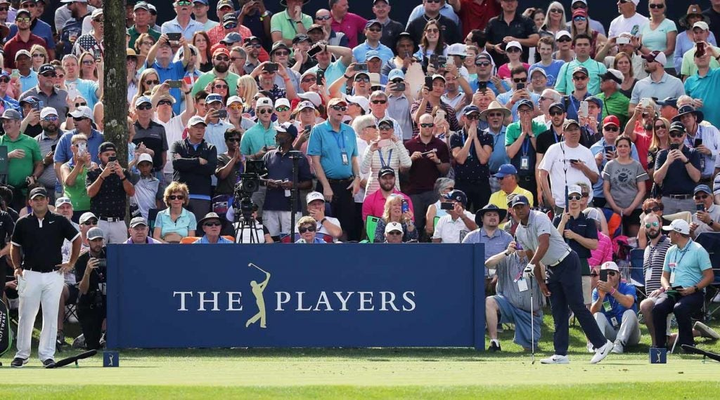 Playing with Tiger Woods means playing for a packed house. Patrick Reed likes that.