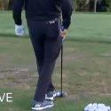 Sergio Garcia tees up ball with foot