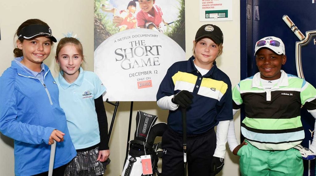 Alexa Pano (left) poses for a photo during a promotional event for The Short Game in December 2013 at Chelsea Piers in New York City.