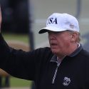 Donlad Trump plays golf during a recent visit to his course in Scotland